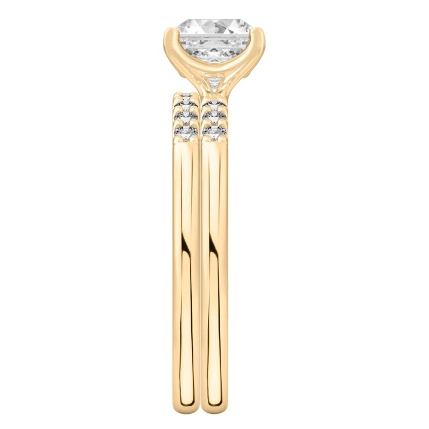 Side view of asscher cut diamond minimalist pave engagement ring set yellow gold