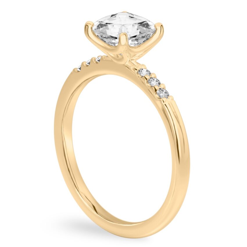 Angle view of asscher cut diamond minimalist pave engagement ring in yellow gold