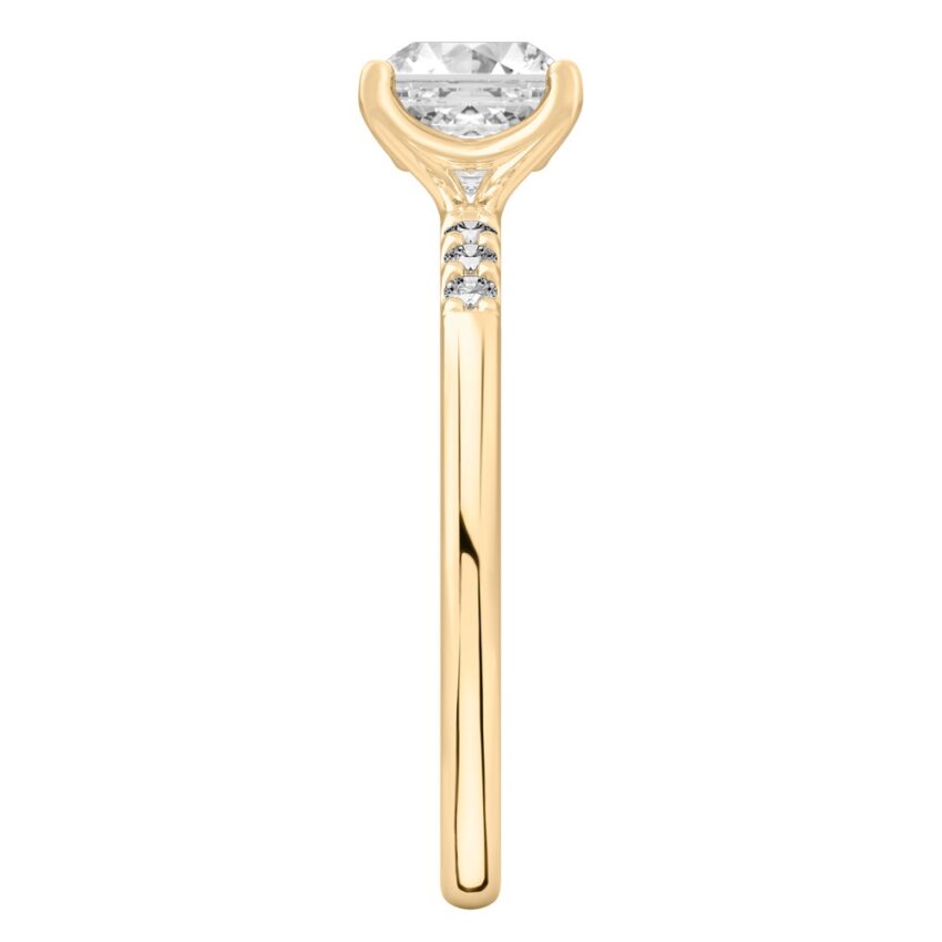 Side view of asscher cut diamond minimalist pave engagement ring in yellow gold