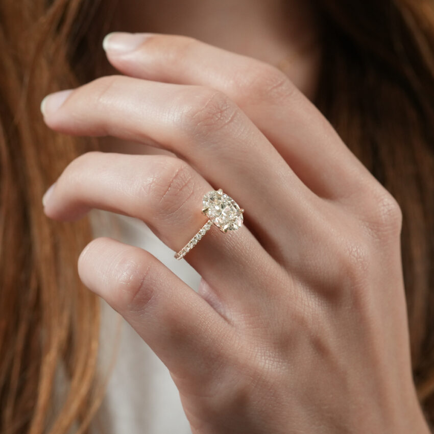 delicate pave engagement ring in lifestyle