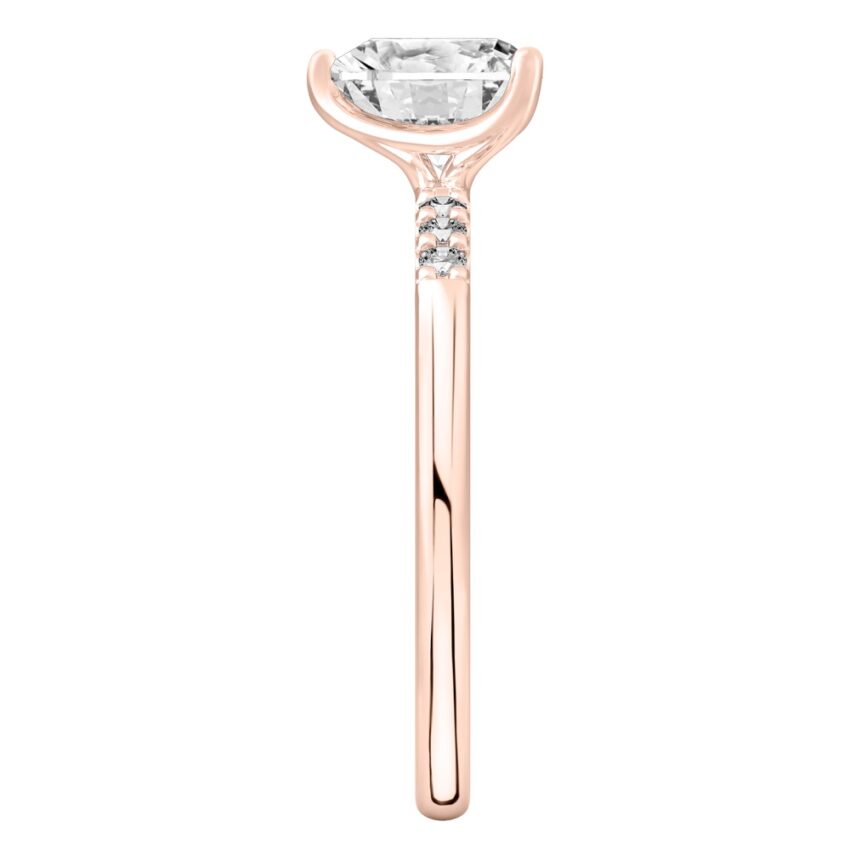 Side view of heart shape diamond minimalist pave engagement ring in rose gold