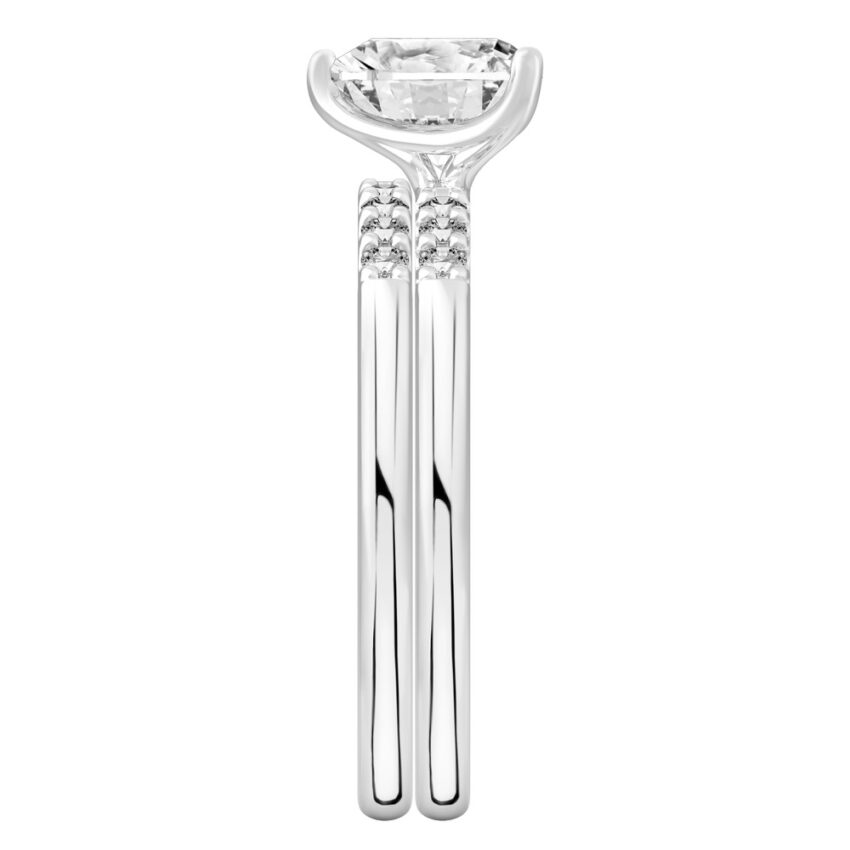 Side view of heart shape diamond minimalist pave engagement ring set platinum