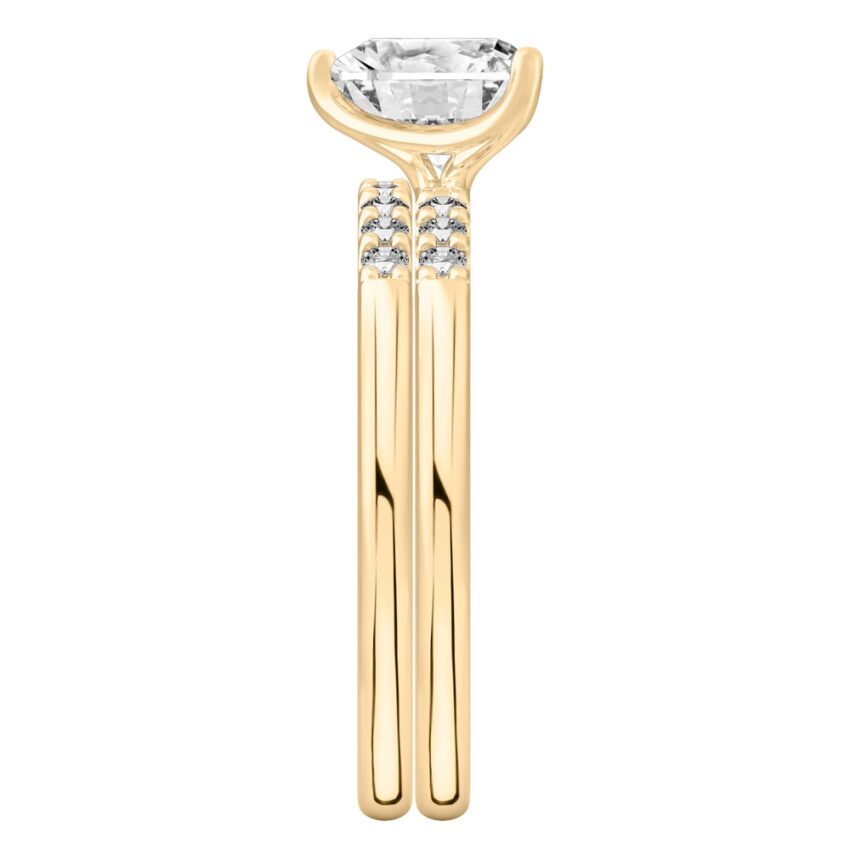 Side view of heart shape diamond minimalist pave engagement ring set yellow gold