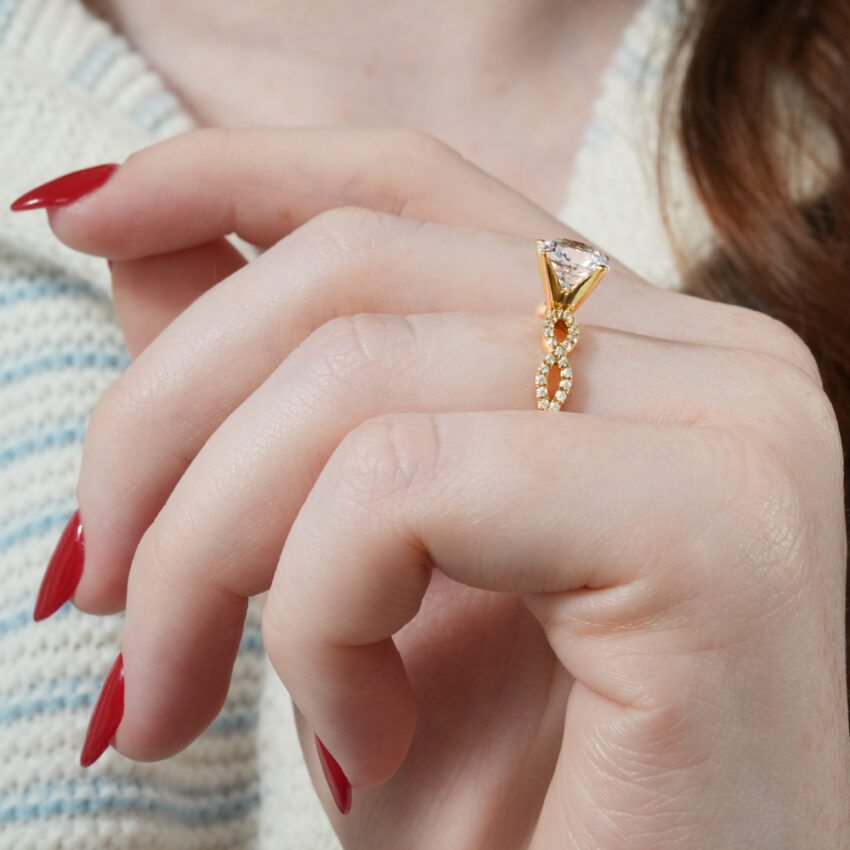 Angle view of infinity engagement ring in lifestyle