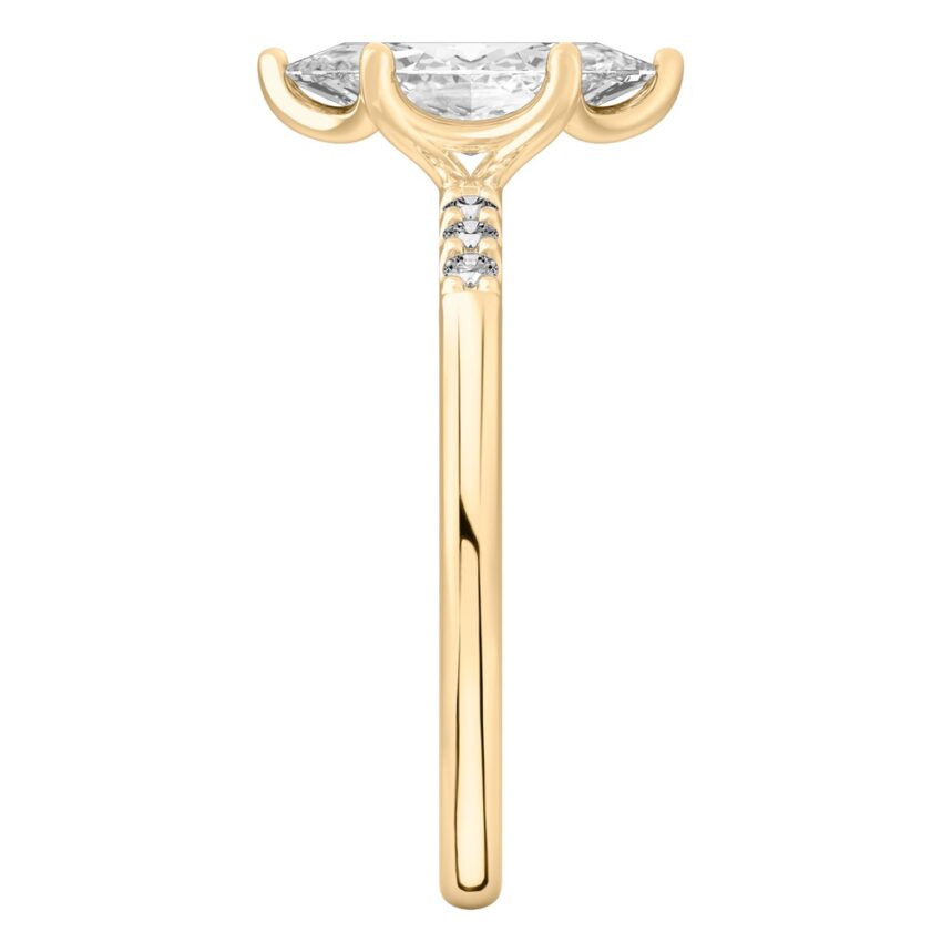 Side view of marquise cut diamond minimalist pave engagement ring in yellow gold