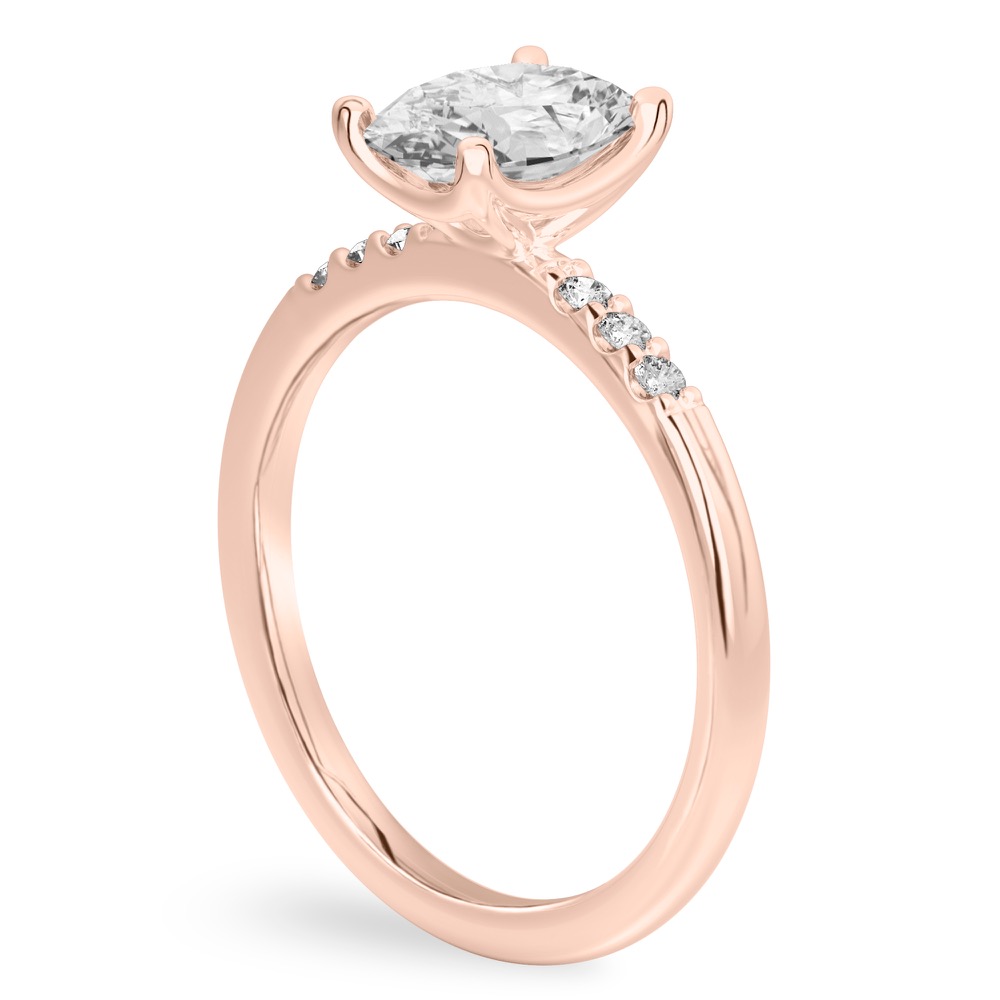 Angle view of oval cut diamond minimalist pave engagement ring in rose gold