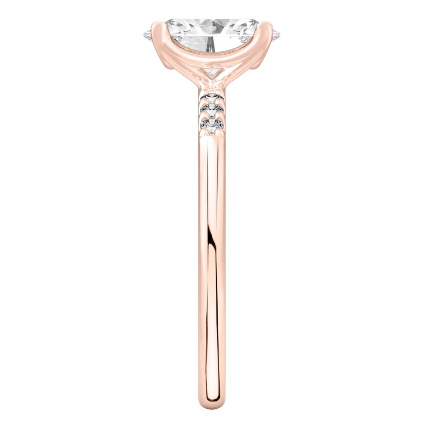 Side view of oval cut diamond minimalist pave engagement ring in rose gold