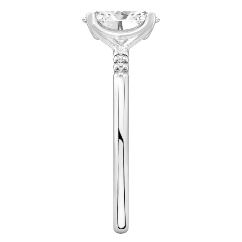 Side view of oval cut diamond minimalist pave engagement ring in white gold