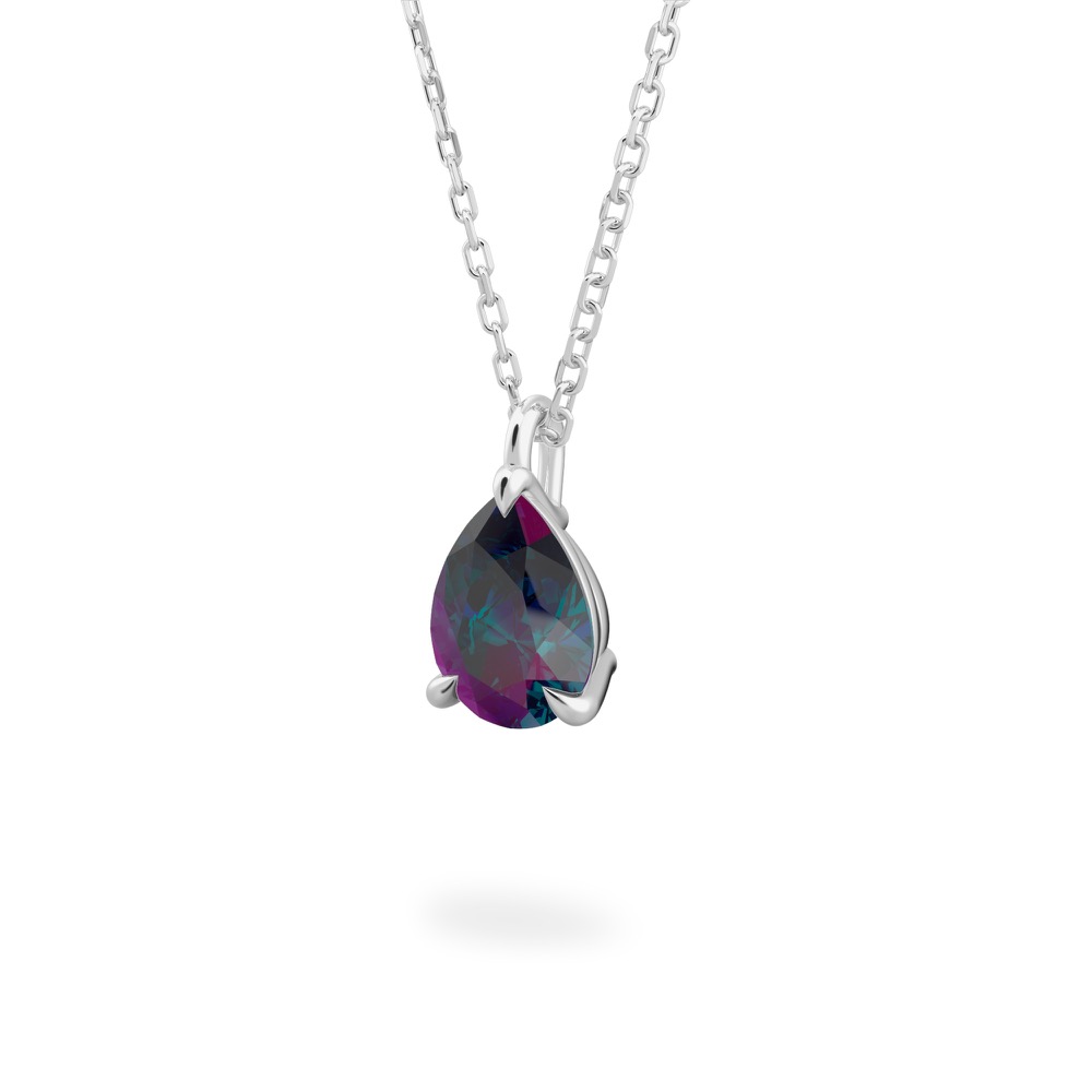 Angle view of pear alexandrite necklace in and earrings platinum