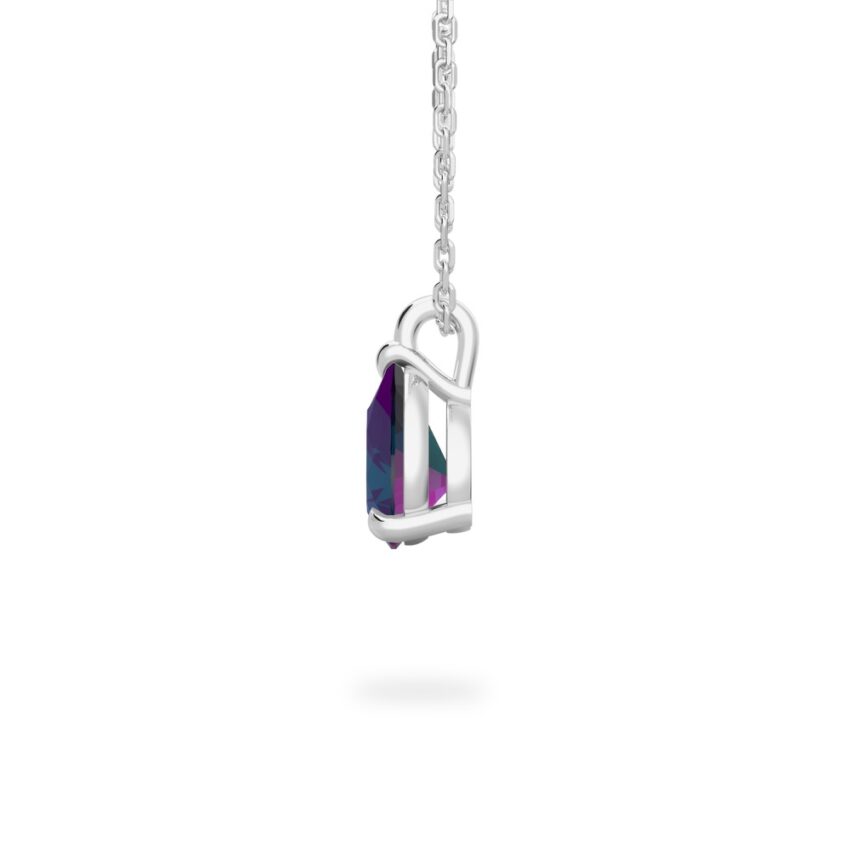 Side view of pear alexandrite necklace in and earrings white gold