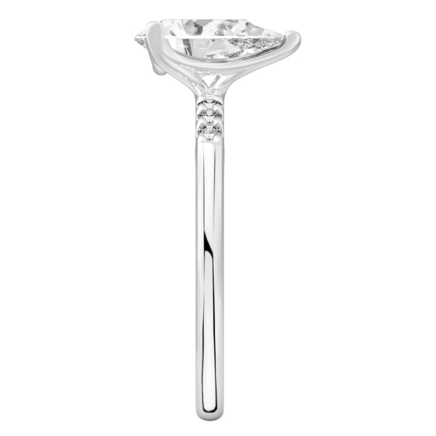 Side view of pear shape diamond minimalist pave engagement ring in platinum