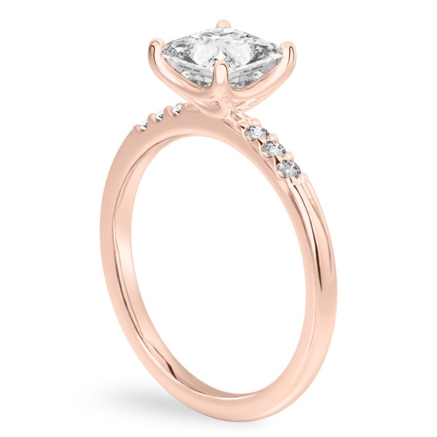 Angle view of princess cut diamond minimalist pave engagement ring in rose gold