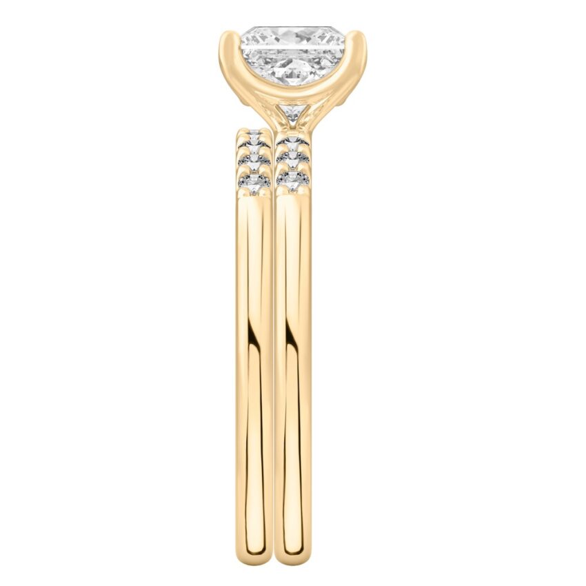 Side view of princess cut diamond minimalist pave engagement ring set yellow gold