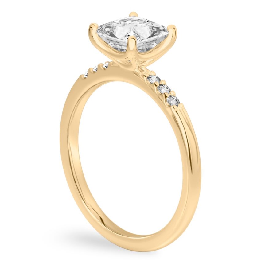 Angle view of princess cut diamond minimalist pave engagement ring in yellow gold