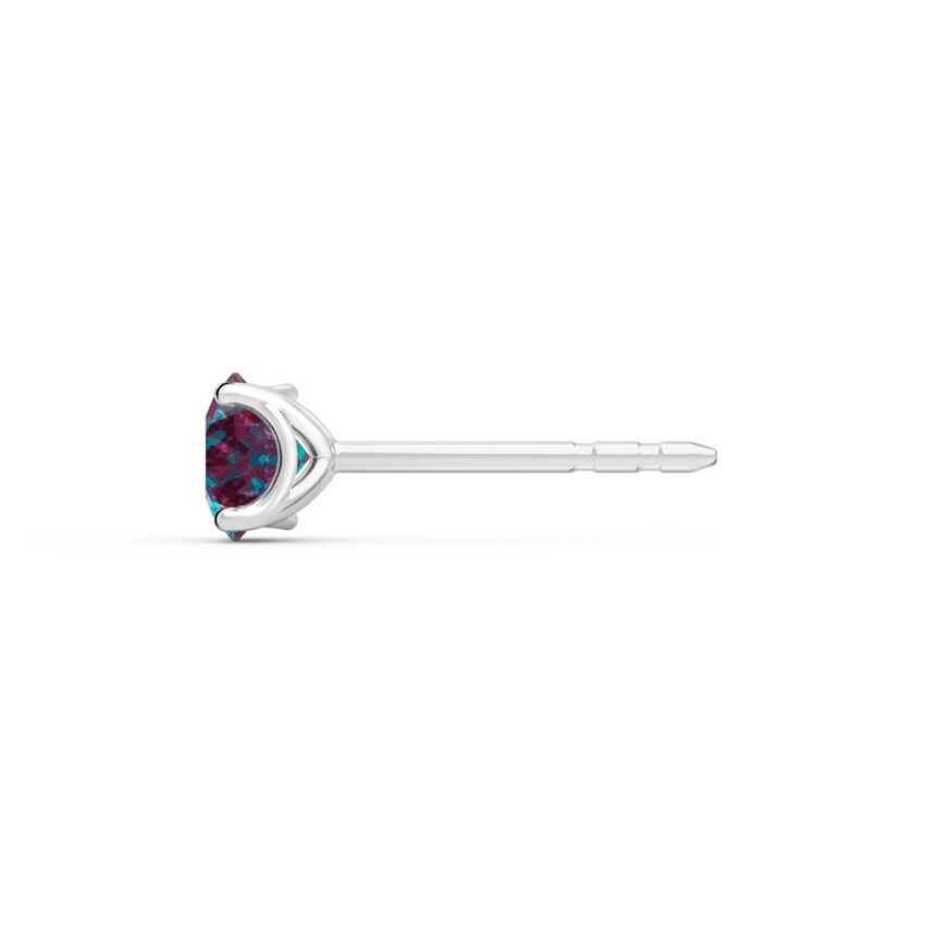 Side view of round cut alexandrite necklace in and earrings platinum
