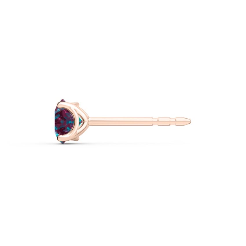 Side view of round cut alexandrite necklace in and earrings rose gold