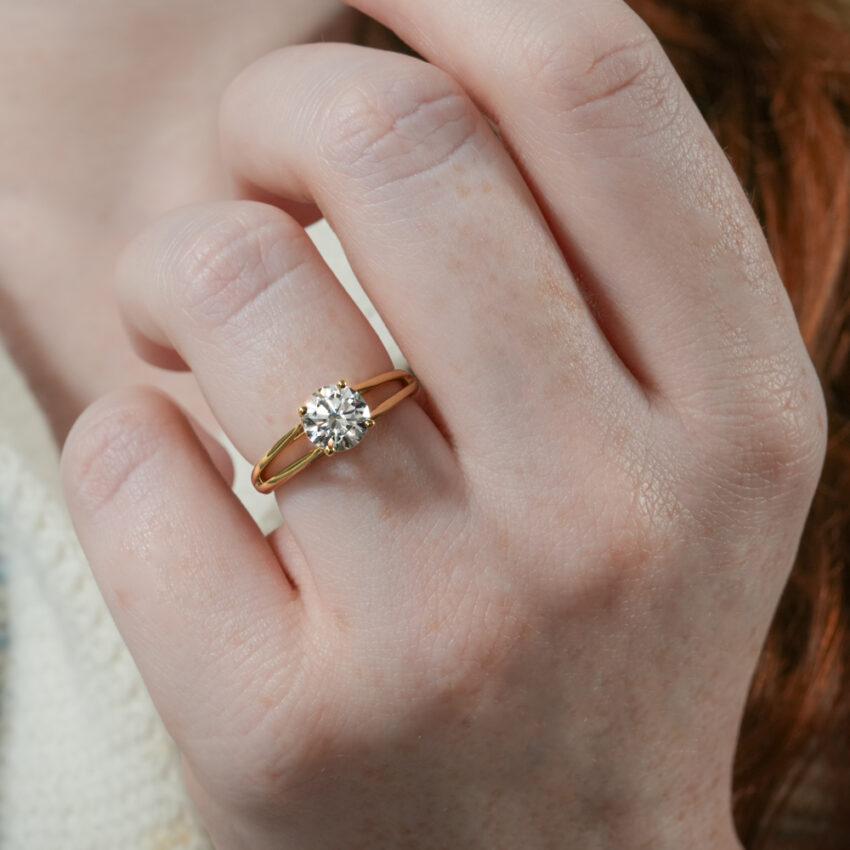 Video of unity ring split shank solitaire engagement ring in lifestyle