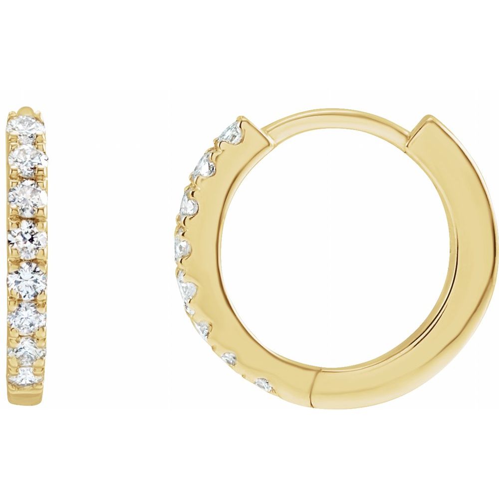 Angle view of 12mm diamond huggie earrings yellow gold