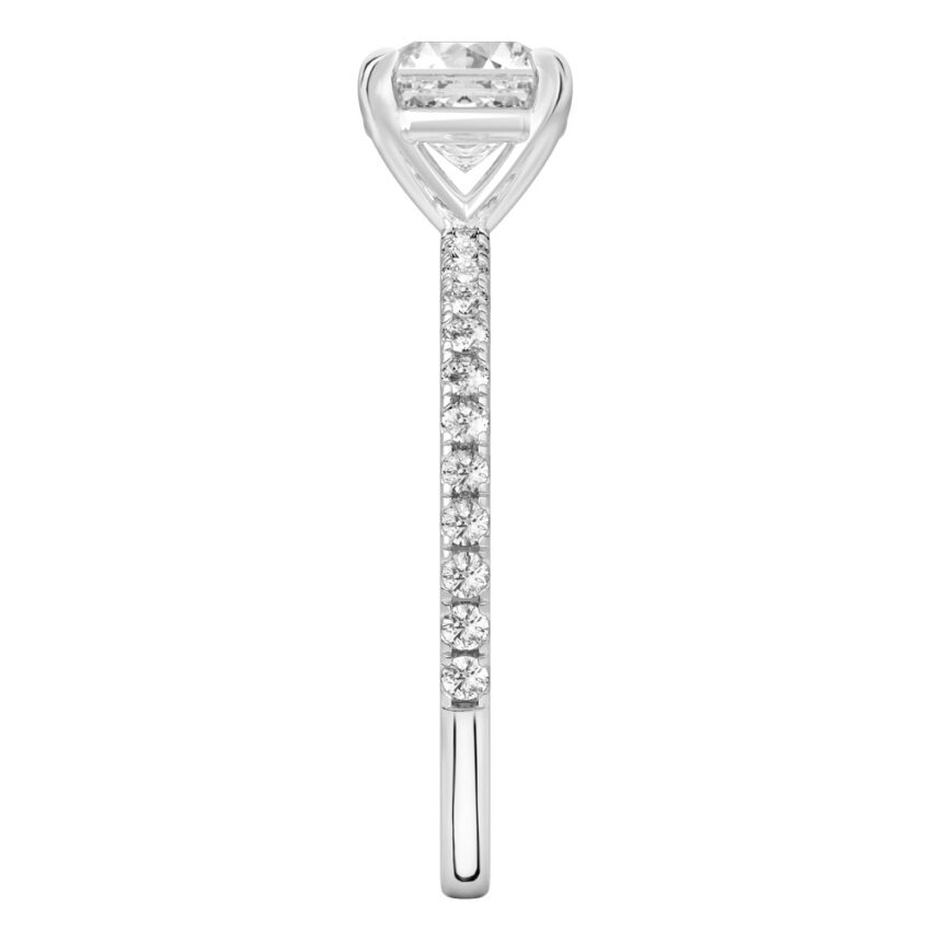 Side view of asscher cut diamond delicate pave engagement ring in white gold