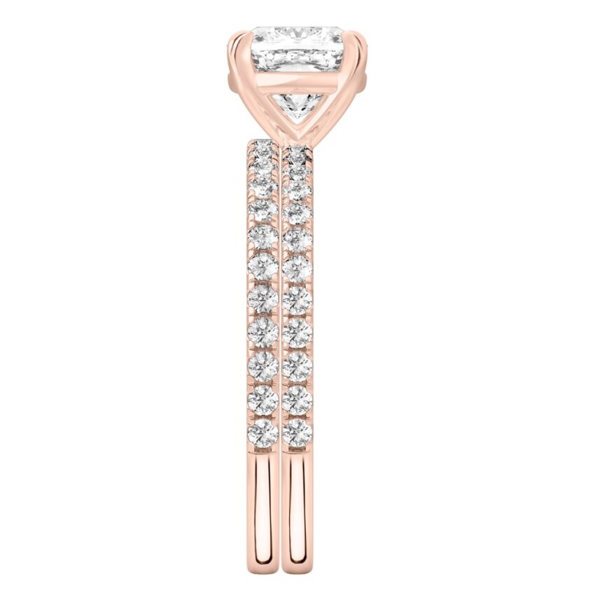 Side view of cushion cut diamond delicate pave engagement ring set rose gold