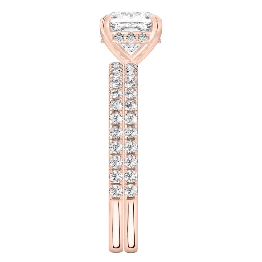 Side view of cushion cut diamond delicate pave hidden halo engagement ring set rose gold