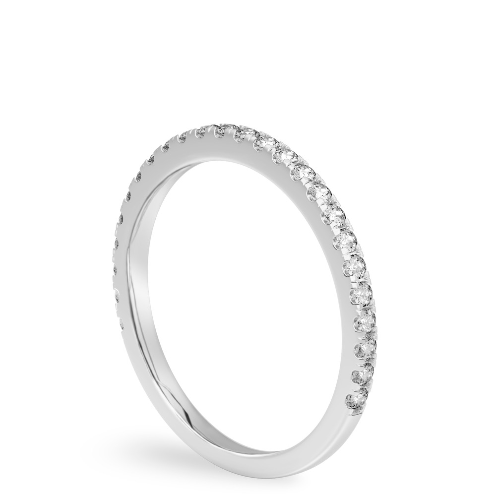 Angle view of delicate pave diamond wedding band in platinum
