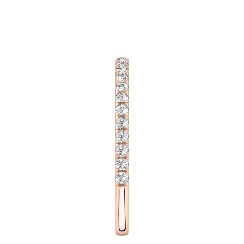 Side view of delicate pave diamond wedding band in rose gold