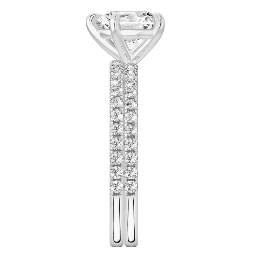 Side view of heart shape diamond delicate pave engagement ring set platinum