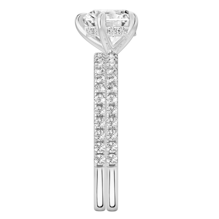 Side view of heart shape diamond delicate pave hidden halo engagement ring set palladium