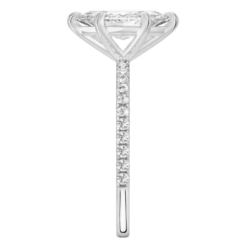 Side view of marquise cut diamond delicate pave engagement ring in palladium