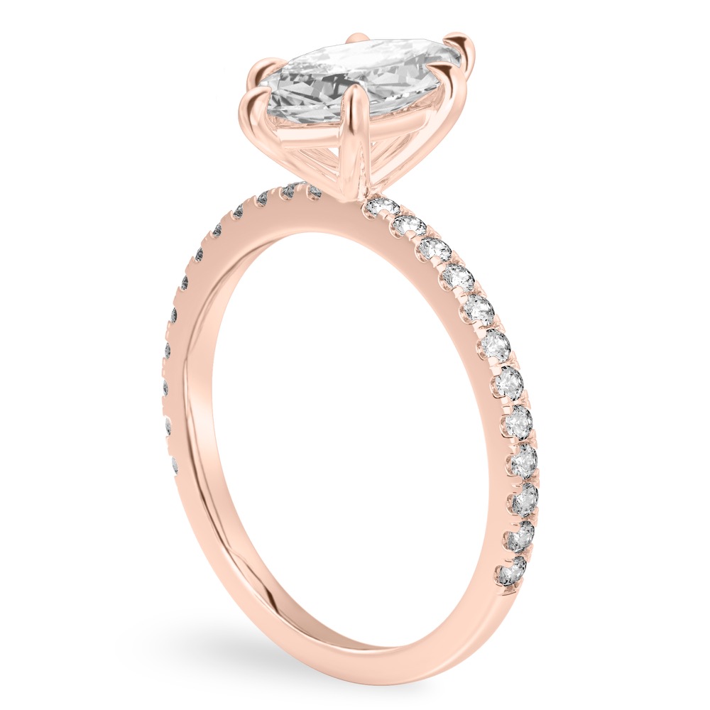Angle view of marquise cut diamond delicate pave engagement ring in rose gold