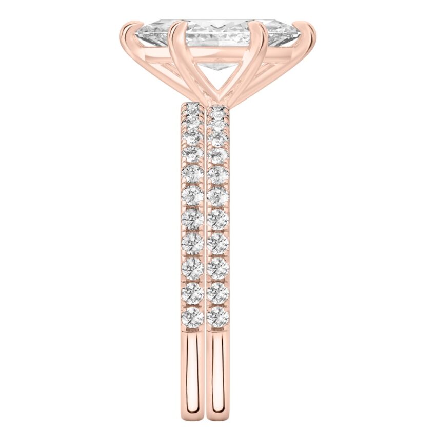 Side view of marquise cut diamond delicate pave engagement ring set rose gold