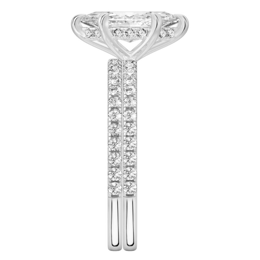 Side view of marquise cut diamond delicate pave hidden halo engagement ring set palladium