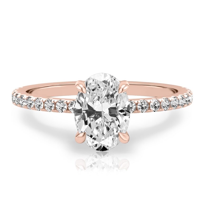 oval cut diamond delicate pave engagement ring in rose gold