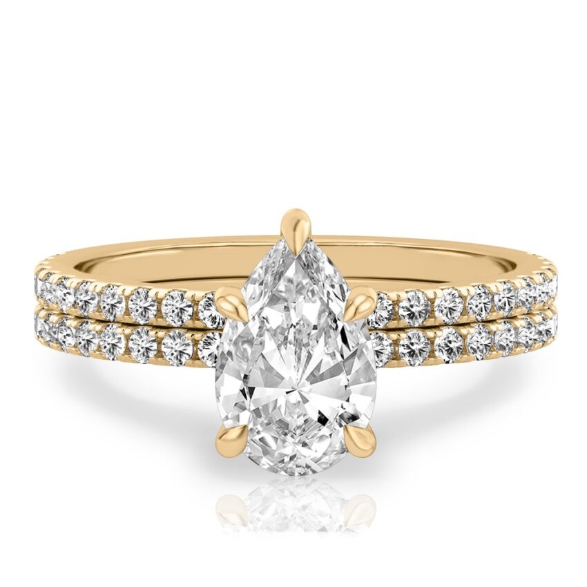 pear shape diamond delicate pave engagement ring set yellow gold