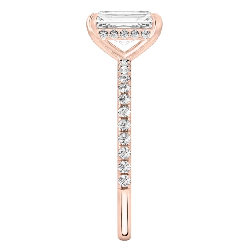 Side view of radiant cut diamond delicate pave hidden halo engagement ring in rose gold