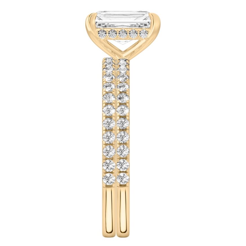 Side view of radiant cut diamond delicate pave hidden halo engagement ring set yellow gold