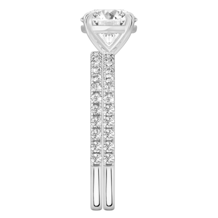 Side view of round cut diamond delicate pave engagement ring set white gold