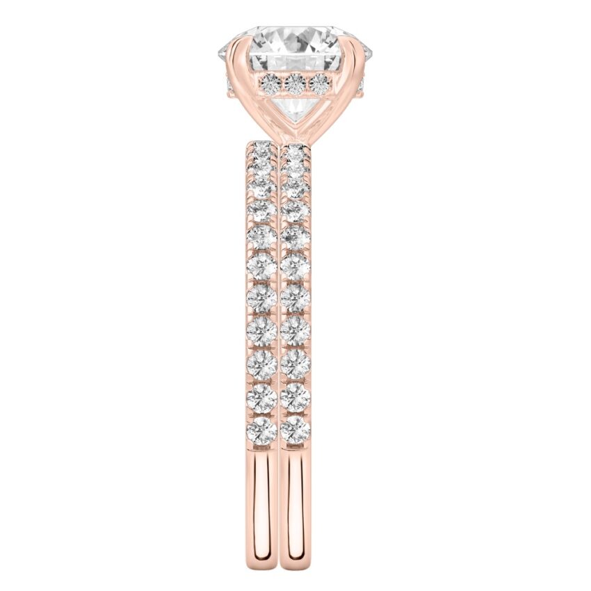 Side view of round cut diamond delicate pave hidden halo engagement ring set rose gold