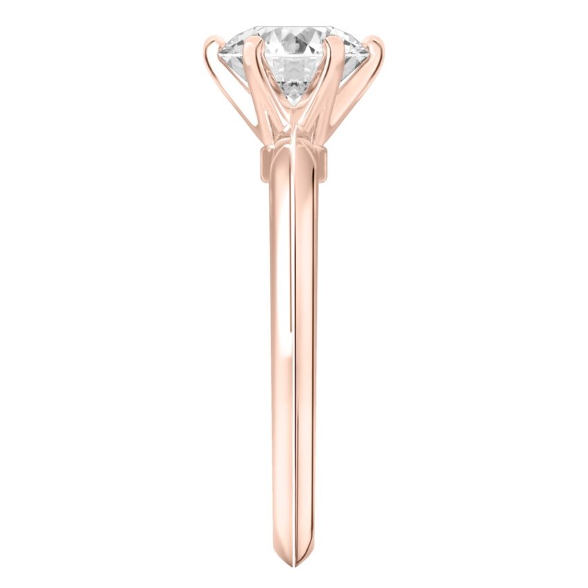 Side view of round cut diamond six prong engagement ring in rose gold