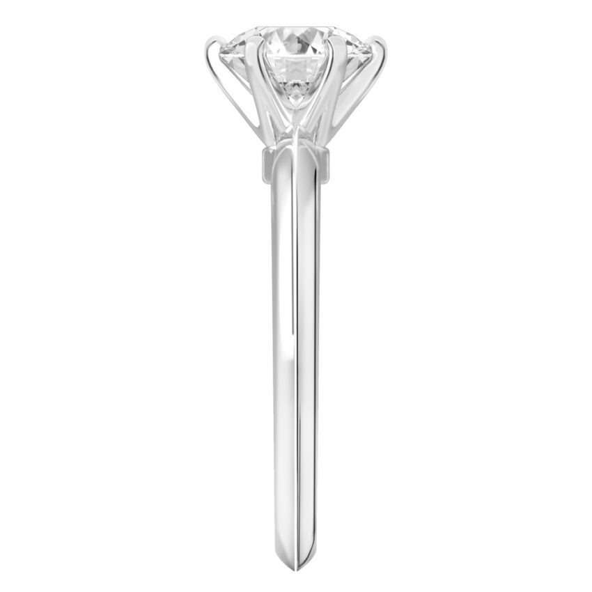 Side view of round cut diamond six prong engagement ring in white gold