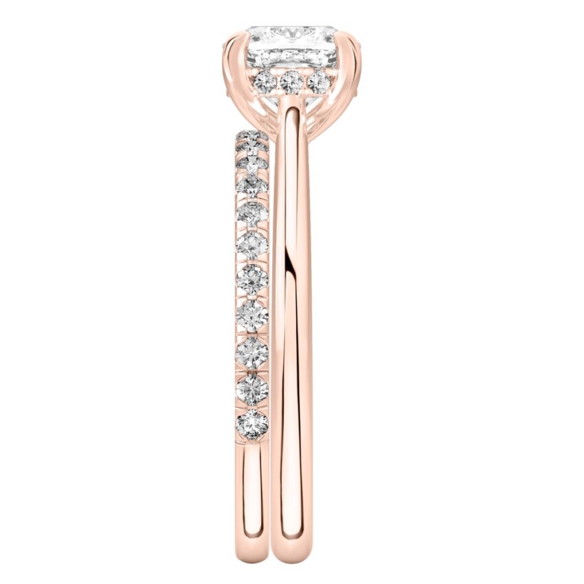 Side view of cushion cut diamond pave bridge engagement ring set rose gold