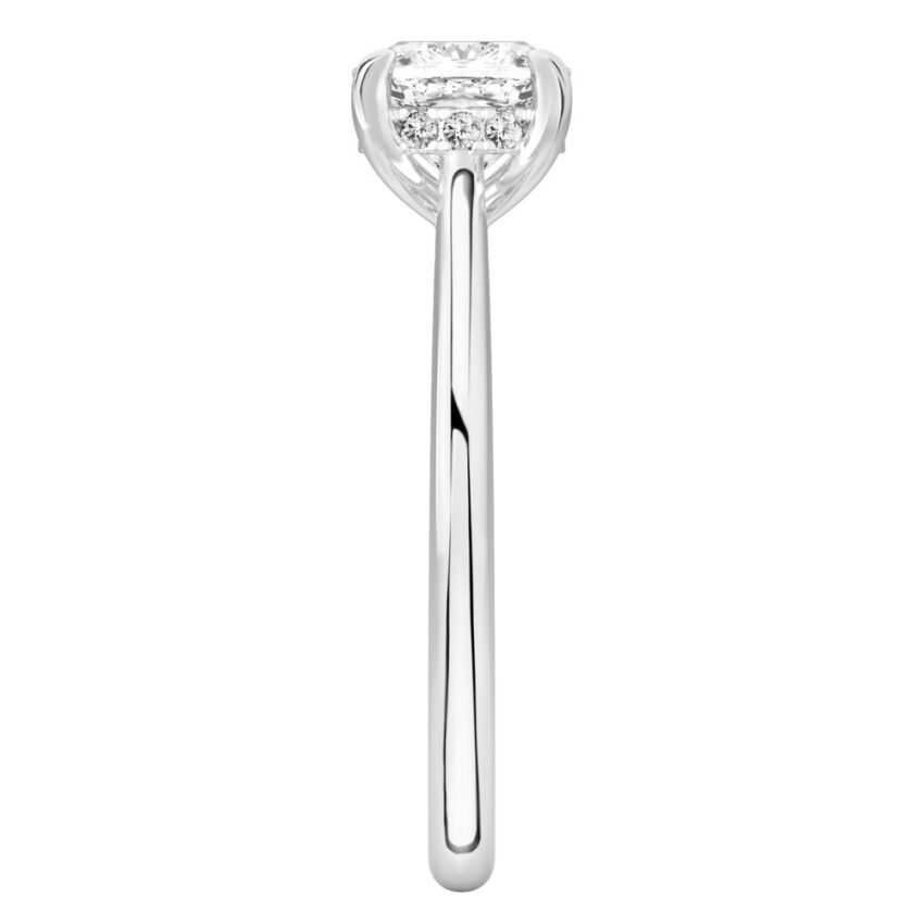 Side view of cushion cut diamond pave bridge engagement ring in white gold