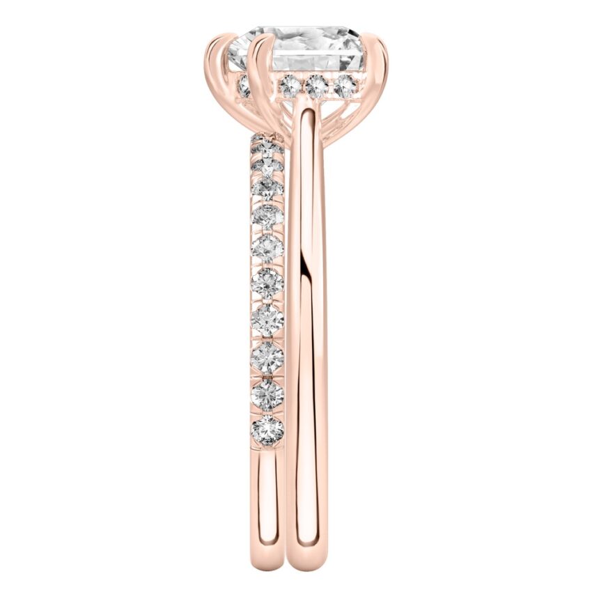 Side view of heart shape diamond pave bridge engagement ring set rose gold