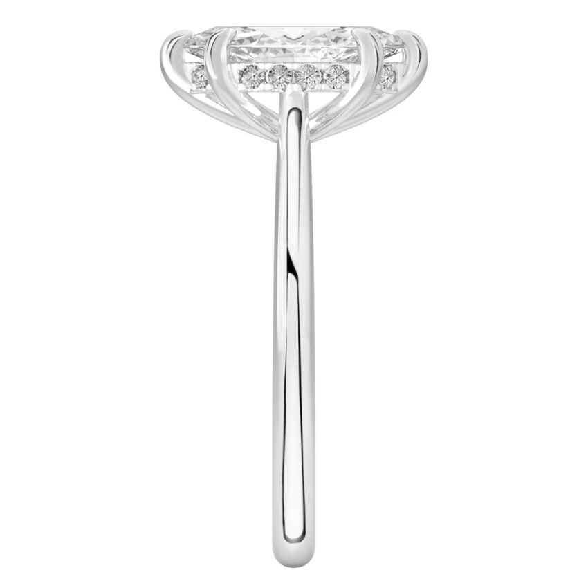 Side view of marquise cut diamond pave bridge engagement ring in platinum