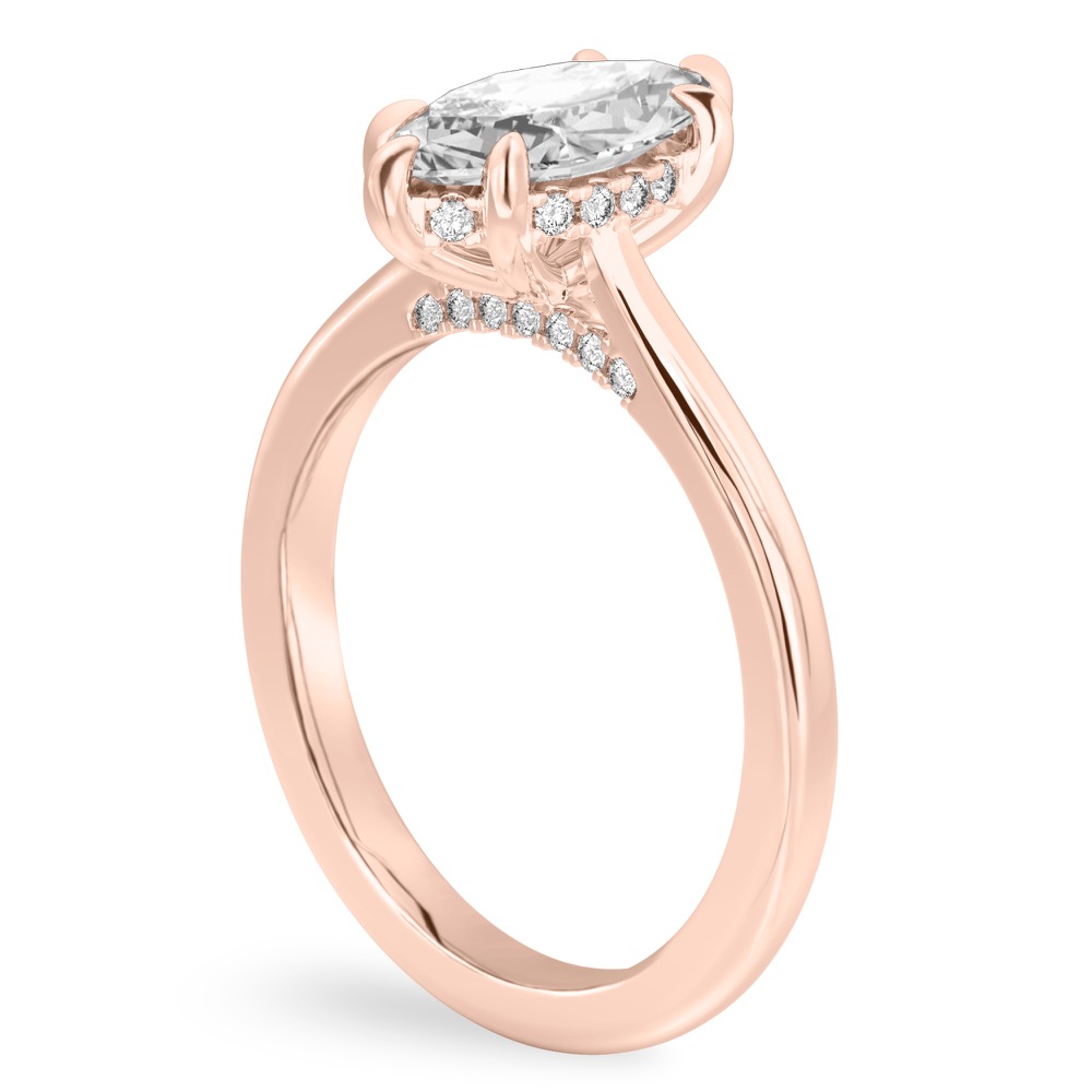 Angle view of marquise cut diamond pave bridge engagement ring in rose gold