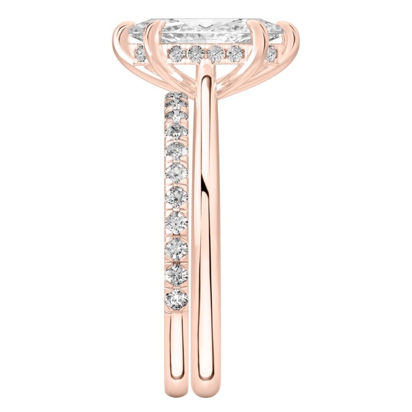 Side view of marquise cut diamond pave bridge engagement ring set rose gold