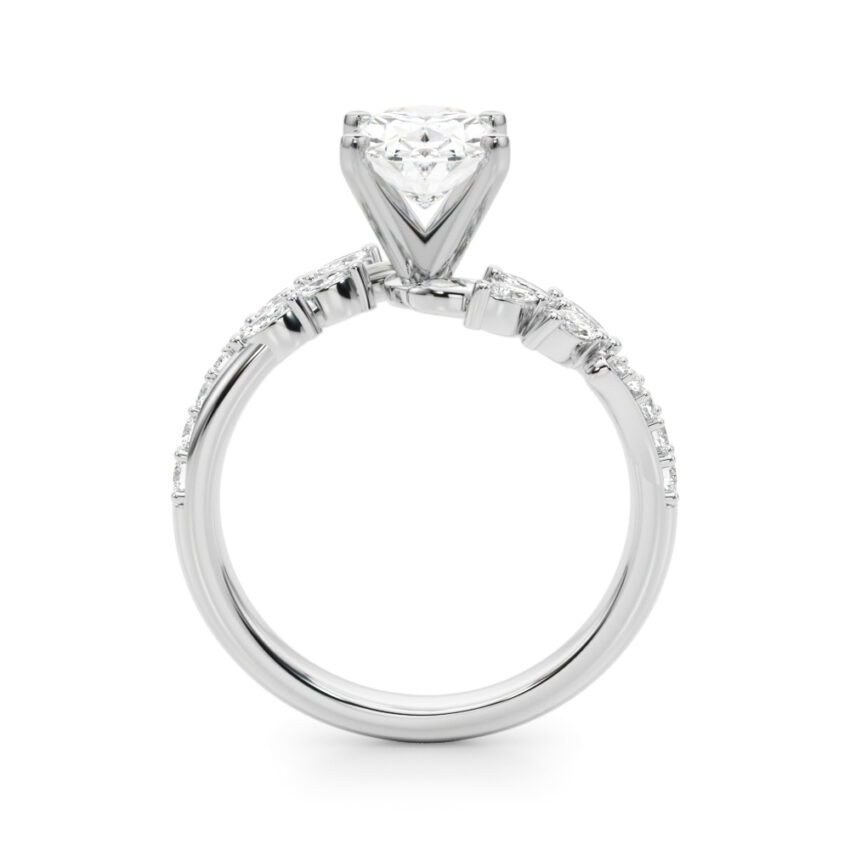 Side view of oval cut diamond bypass nature inspired engagement ring in white gold