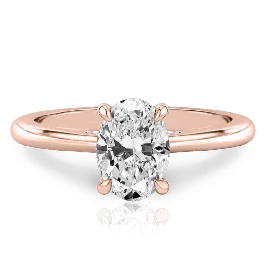 oval cut diamond pave bridge engagement ring in rose gold