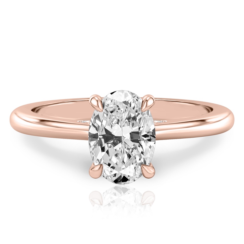 oval cut diamond pave bridge engagement ring in rose gold